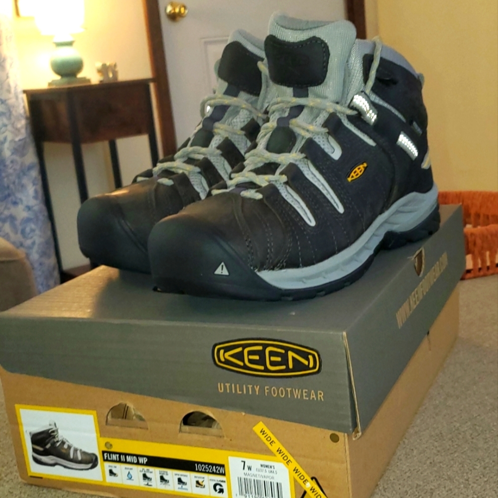 Keen Black and Gray Combat Boots with High-Top Design and Rugged Sole